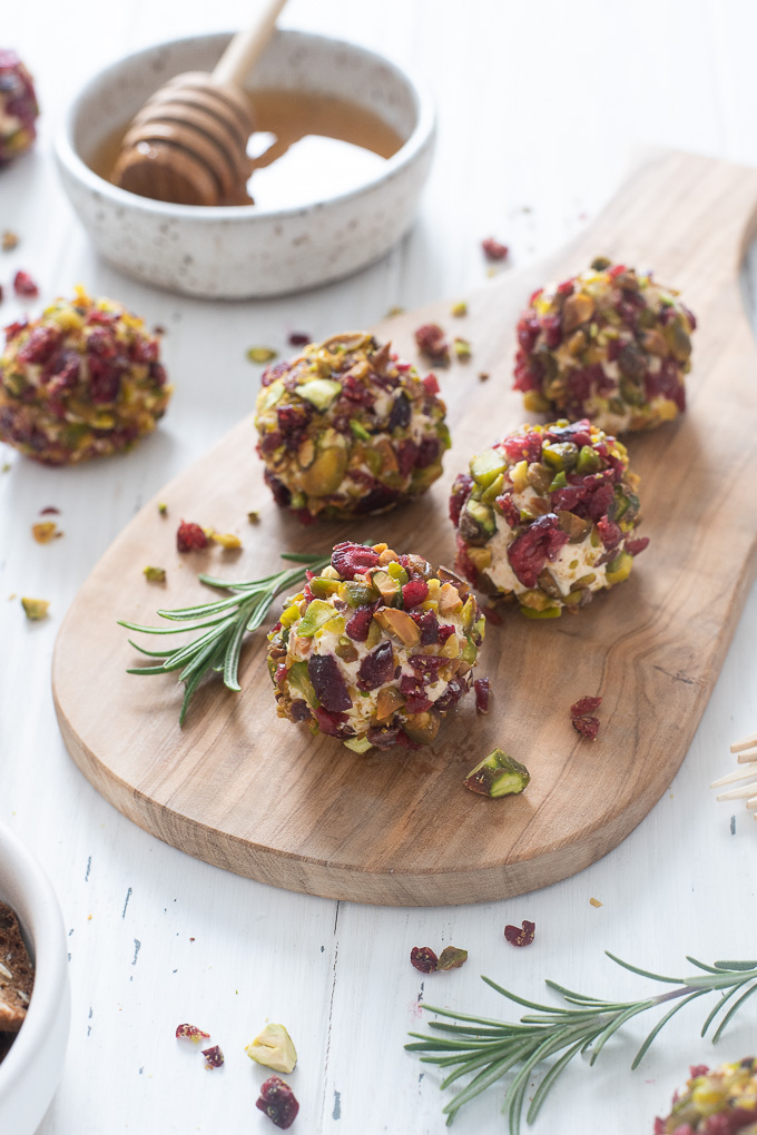 Mini cheese balls rolled in cranberries and pistachios