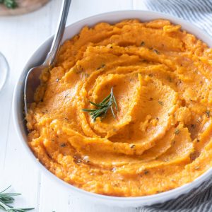 Mashed sweet potatoes in a serving bowl