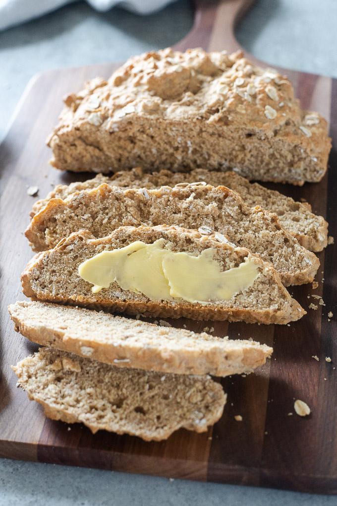 Sliced Irish brown soda bread with butter 