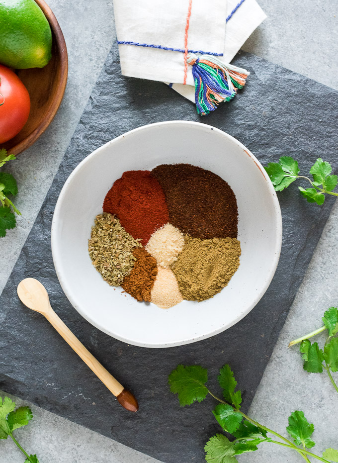 Taco seasoning ingredients sectioned in a bowl