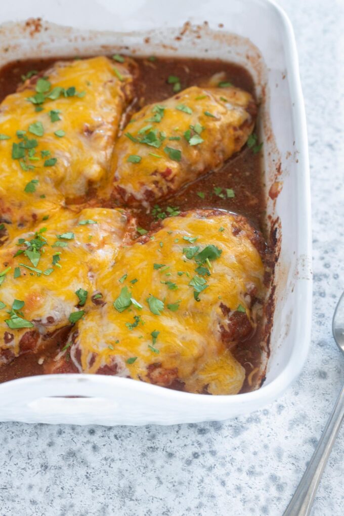 Baked salsa chicken with cheese and cilantro