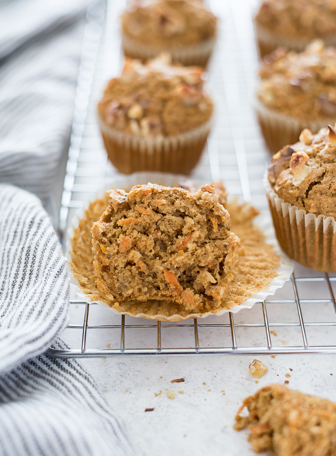 Healthy carrot cake muffins with front muffin cut in half
