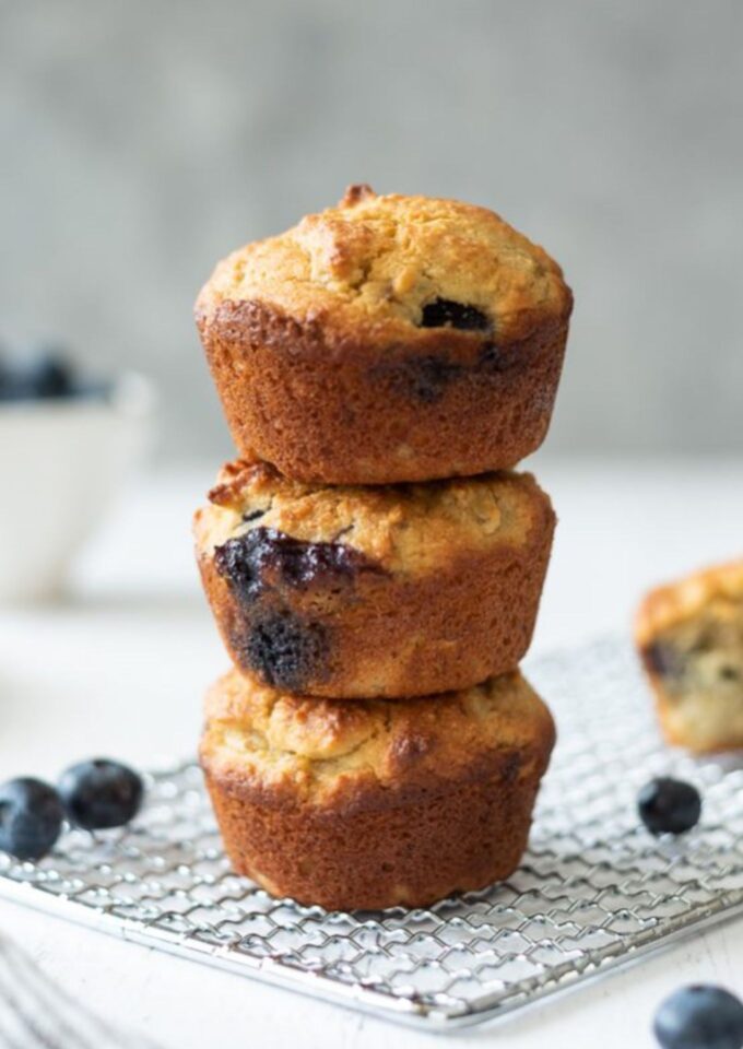Healthy banana blueberry muffins in a stack