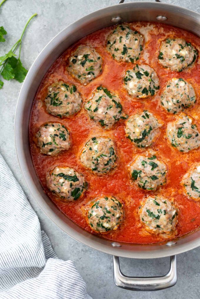 Oven Baked Turkey Meatballs in a skillet with marinara sauce