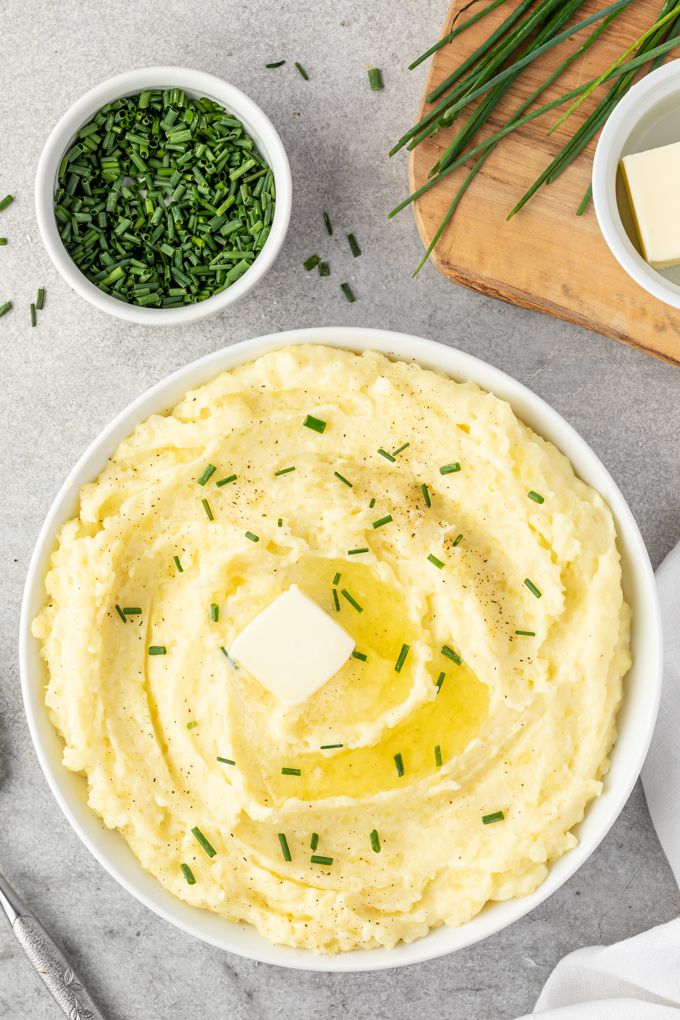 Yukon gold mashed potatoes with melting butter and chopped chives