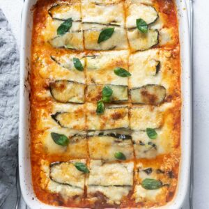 Zucchini lasagna in a baking dish cut into squares