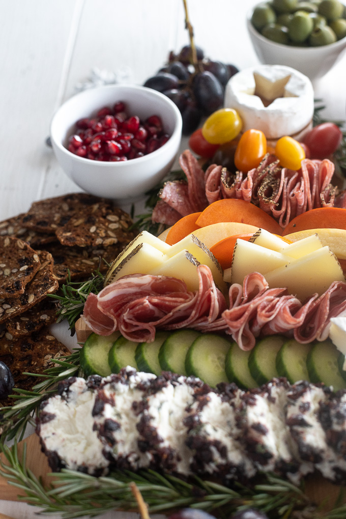 Christmas charcuterie board with manchego, pomegranate and more