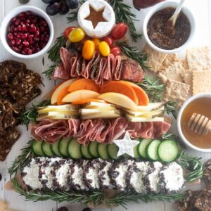 Christmas tree charcuterie board with baby tree star tree topper