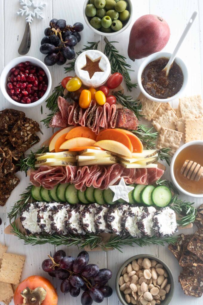 Christmas tree charcuterie board with baby tree star tree topper