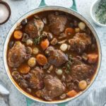 Coq au vin in a Dutch oven.