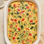 Bacon and egg casserole in baking dish.