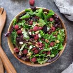 Raspberry salad in a serving bowl.
