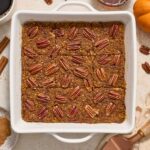 Pumpkin steel cut oat baked oatmeal in baking dish.