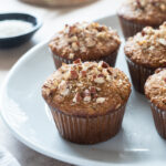 Gluten-free morning glory muffins on a platter.
