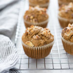 Gluten-free carrot oat muffins on a wire rack.
