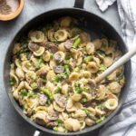 One pot pasta primavera with spring vegetables in skillet.