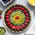 Classic French fruit tart glazed with apricot jelly.