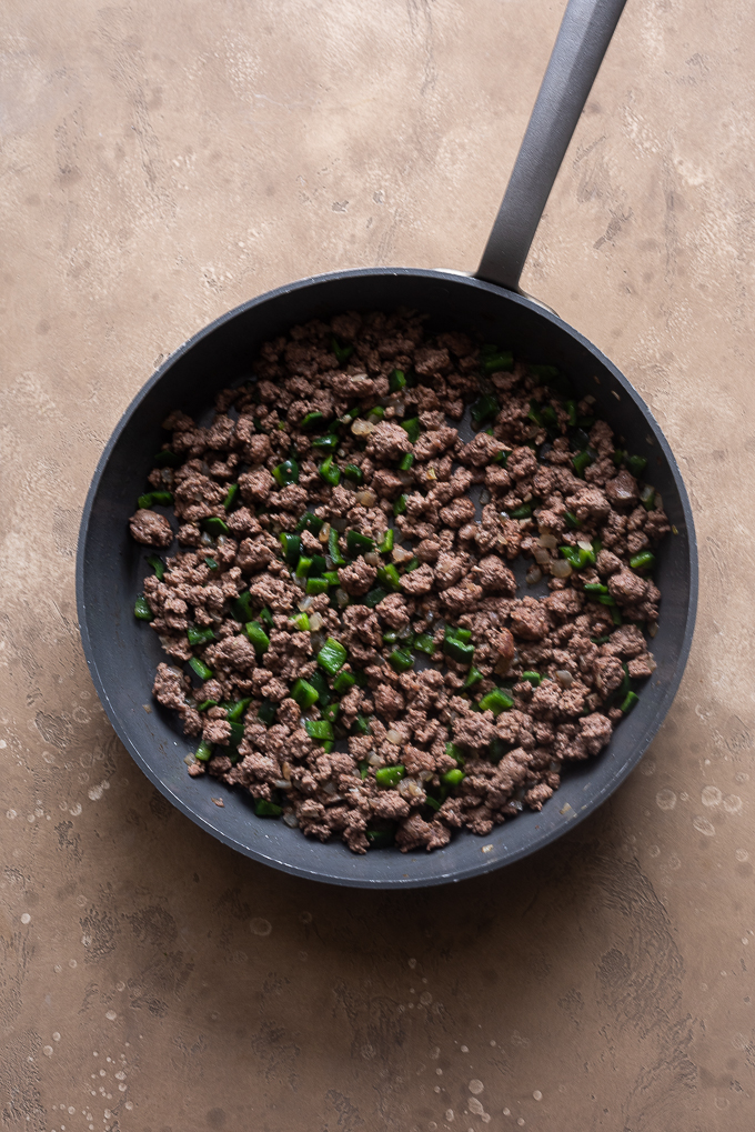 Cooked ground beef and vegetables.