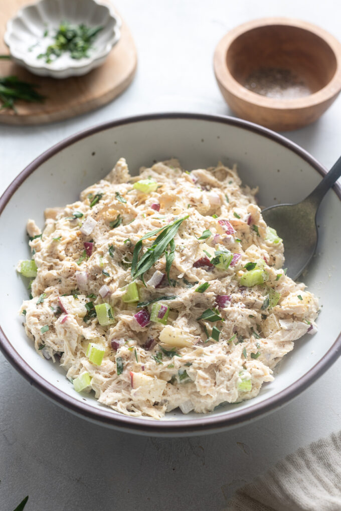 Chicken salad with tarragon in a serving bowl.