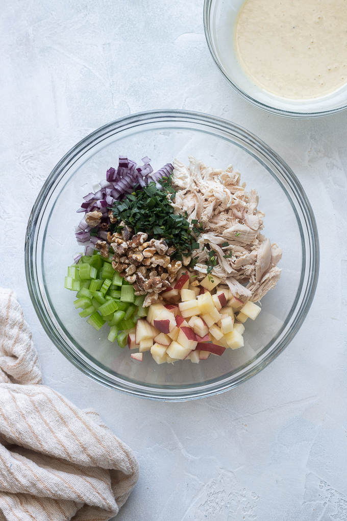 Chicken salad ingredients in a mixing bowl.