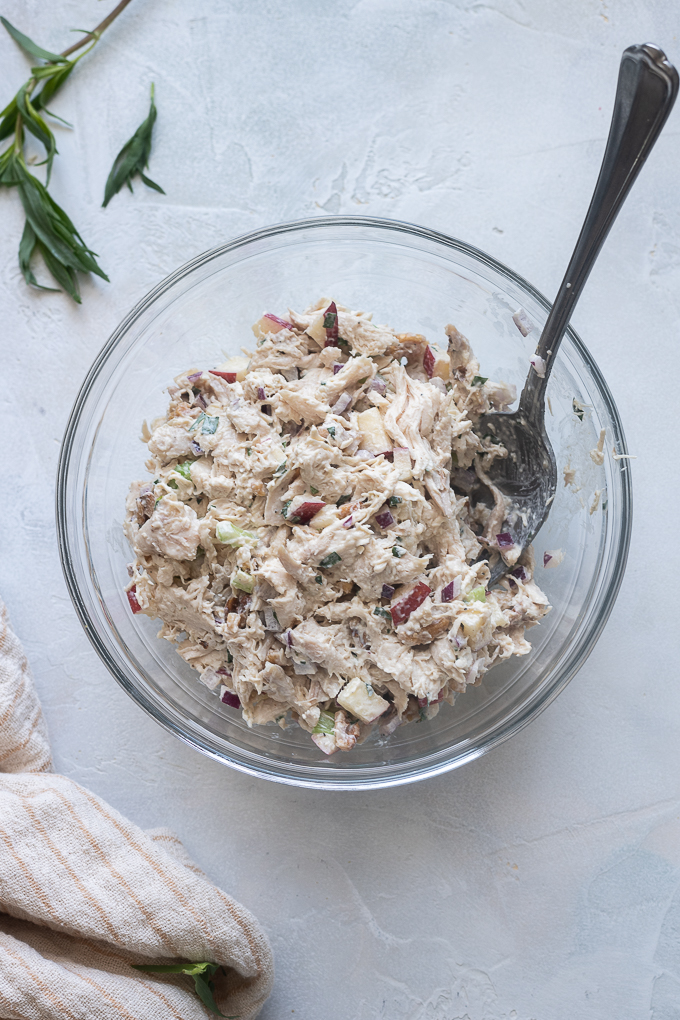 Assembled tarragon chicken salad in mixing bowl.