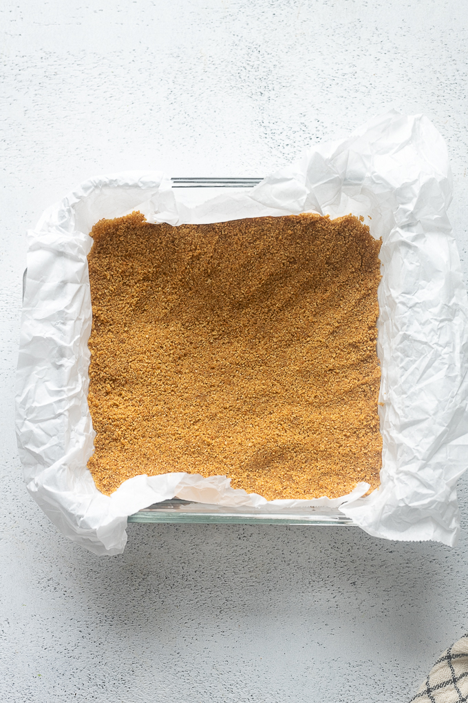 Graham cracker crust before baking.