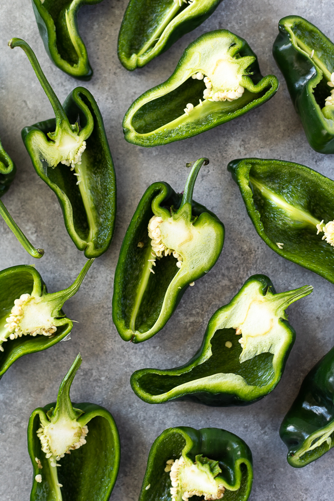Poblano peppers cut in half.