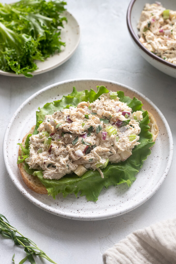Tarragon chicken salad on bread.