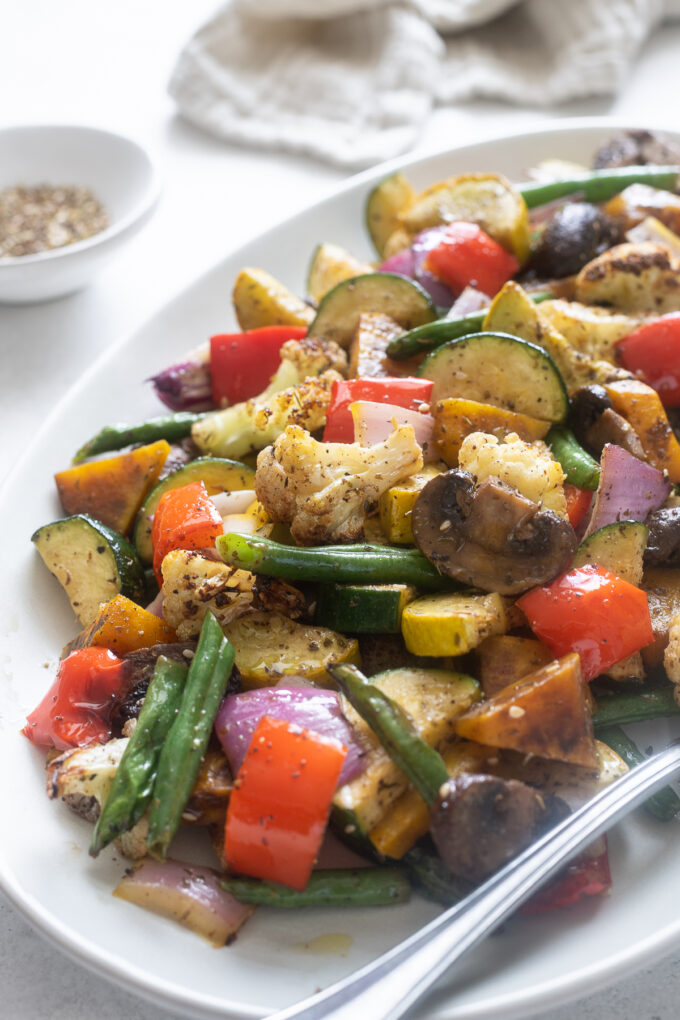 Air fryer roasted vegetables on a serving platter.