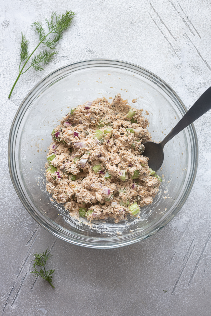 Prepared salmon salad in a mixing bowl.