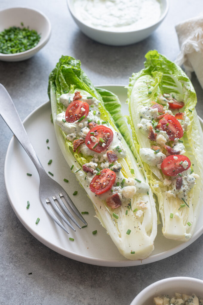 Romaine heart wedge salad with bacon.