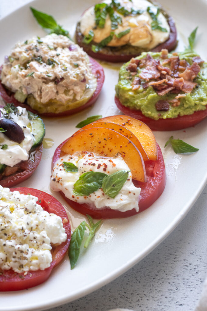 Heirloom tomato flight with (6) different toppings.
