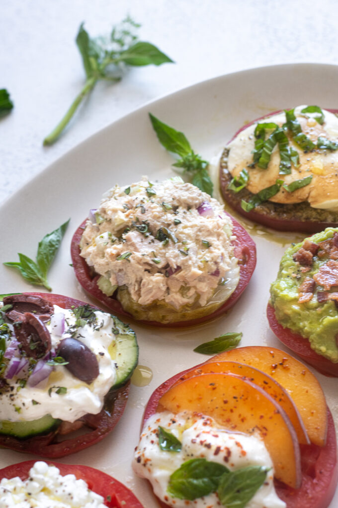 Heirloom tomato flight with tuna salad topping.
