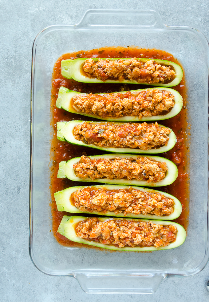 Stuffed zucchini with ground chicken parmesan filling.