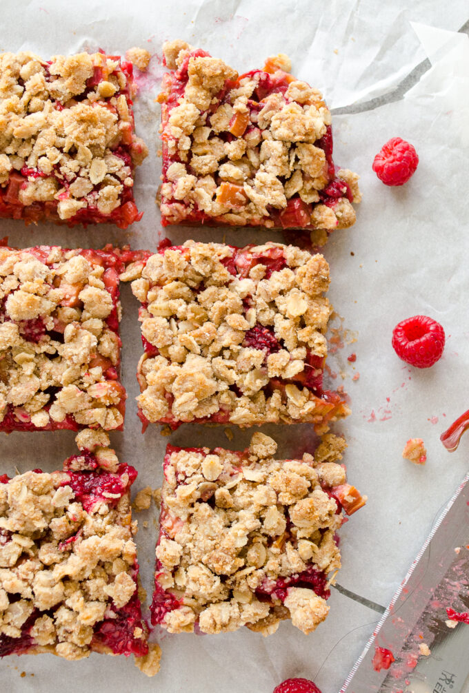Raspberry rhubarb crisp bars cut into squares.
