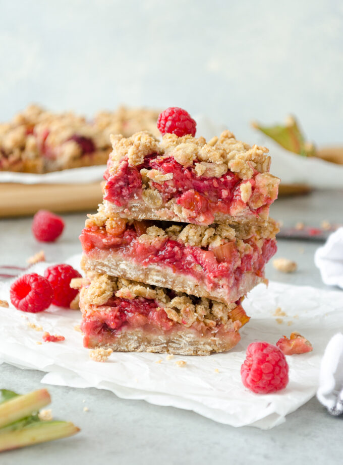 Stack of raspberry rhubarb oatmeal bars.