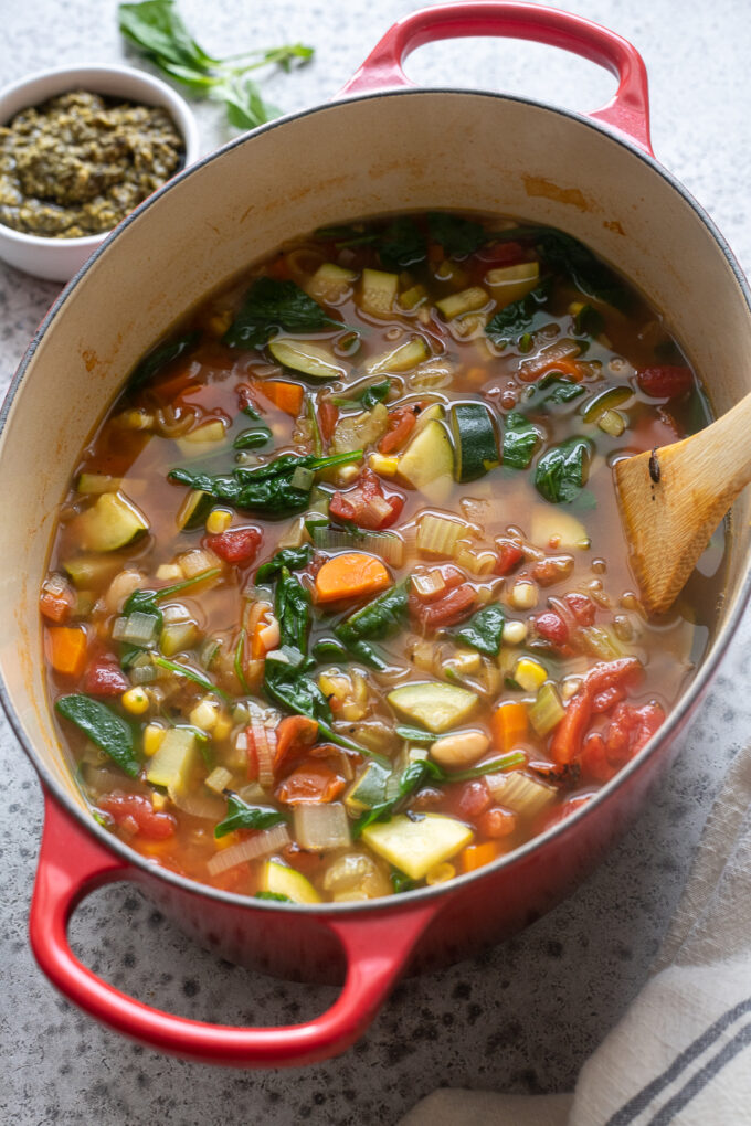 Summer vegetable soup in a Dutch oven.