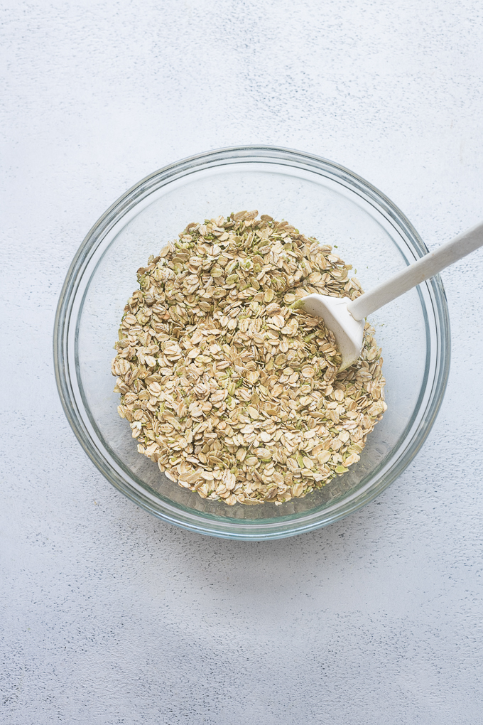 Combined ingredients for matcha overnight oats.