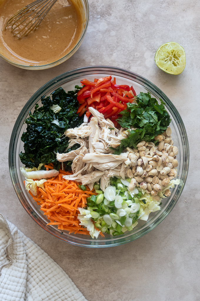 Thai peanut salad ingredients in a mixing bowl.