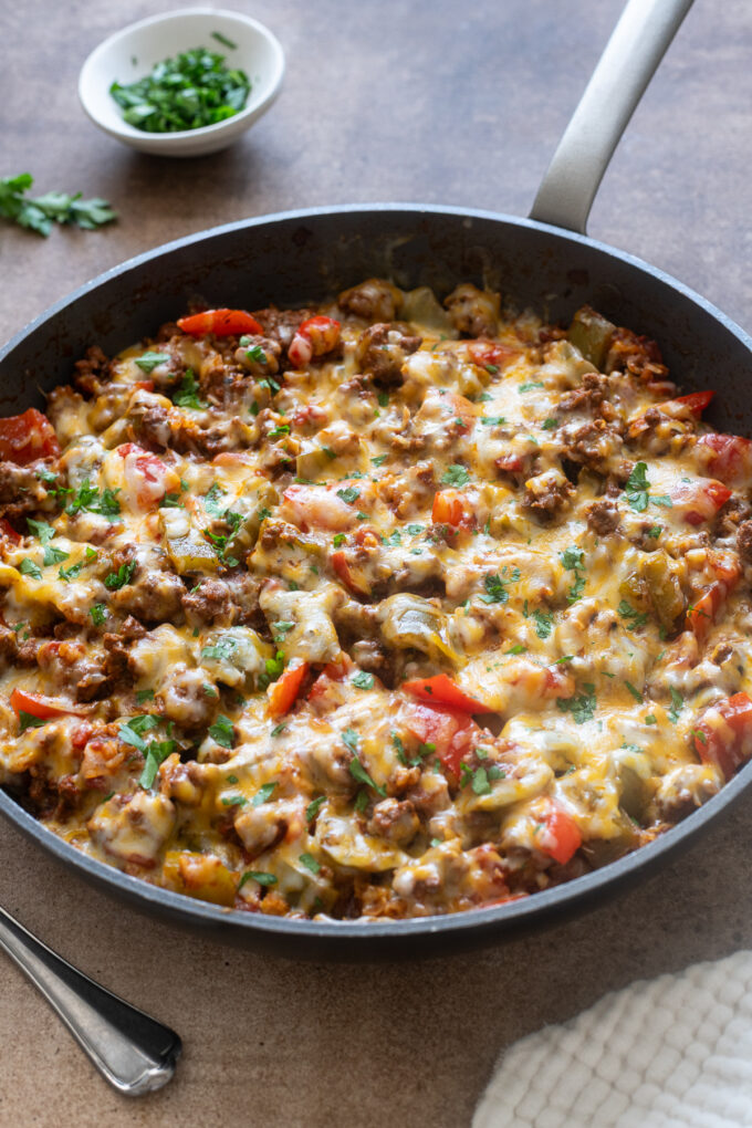 Bell pepper casserole with ground beef in a skillet.