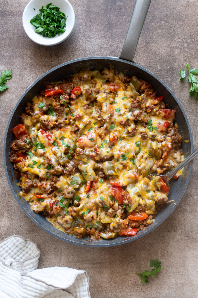 Easy stuffed pepper casserole in a skillet.