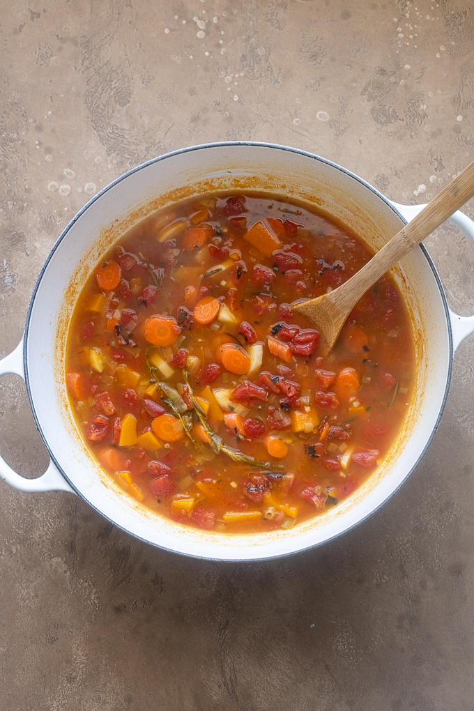 Pot of fall vegetable soup after simmering.