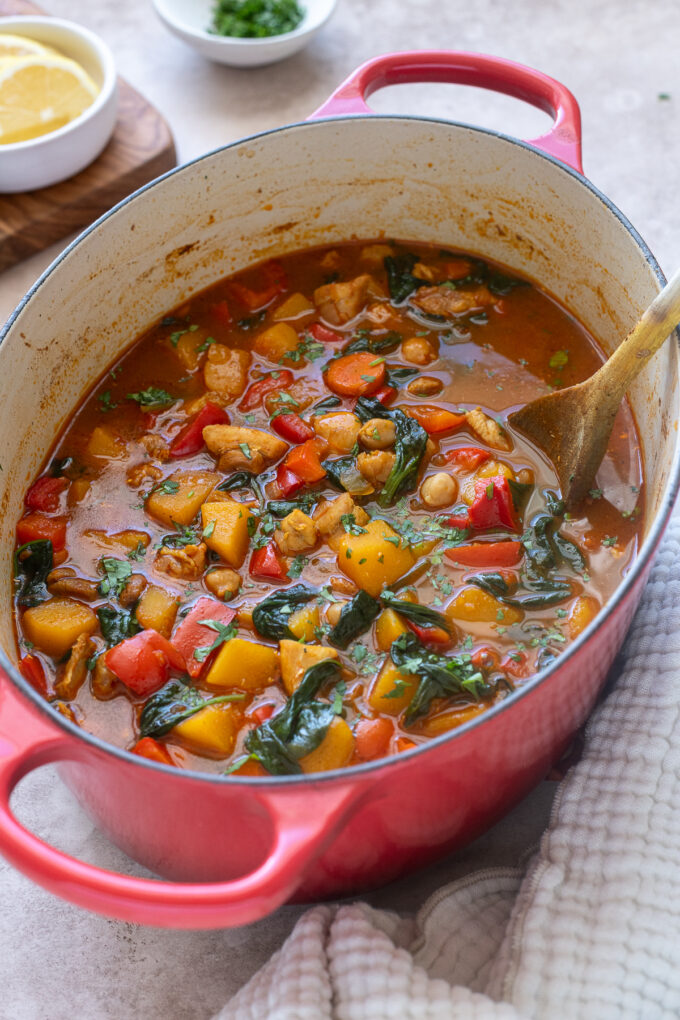 Moroccan chicken and chickpea soup in a Dutch oven.