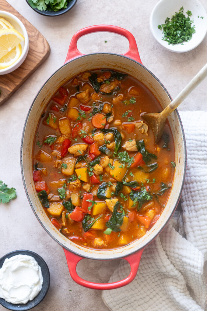 Moroccan soup with chicken and chickpeas in a Dutch oven.