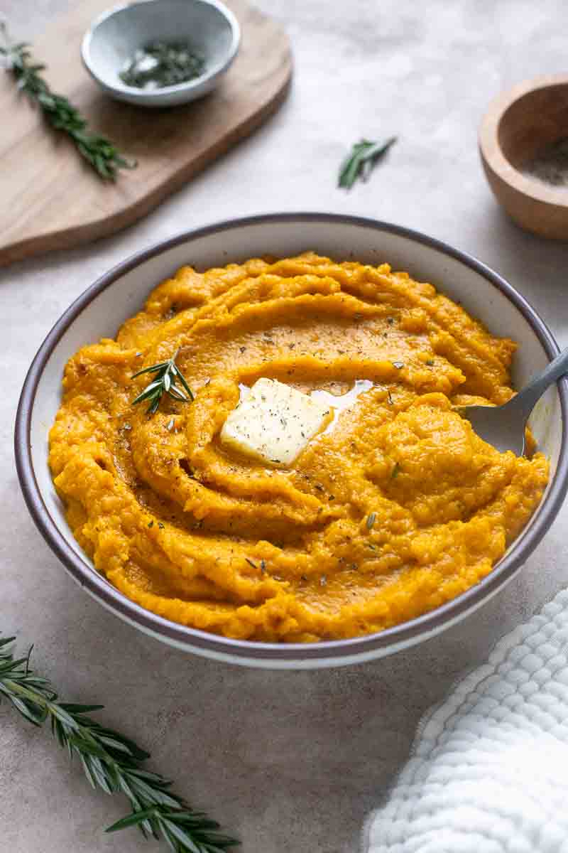 Creamy kabocha squash mash in a serving bowl.