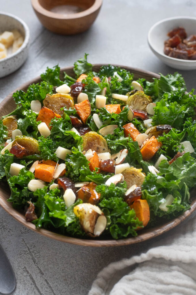 Roasted sweet potato kale salad in a serving bowl.