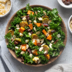 Winter roasted vegetable kale salad in a serving bowl.