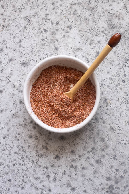 Combine the spices for the sweet and smoky rub for baked pork chops.