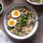 Ground pork ramen with bok choy, shiitake mushrooms, and topped with soft boiled eggs.