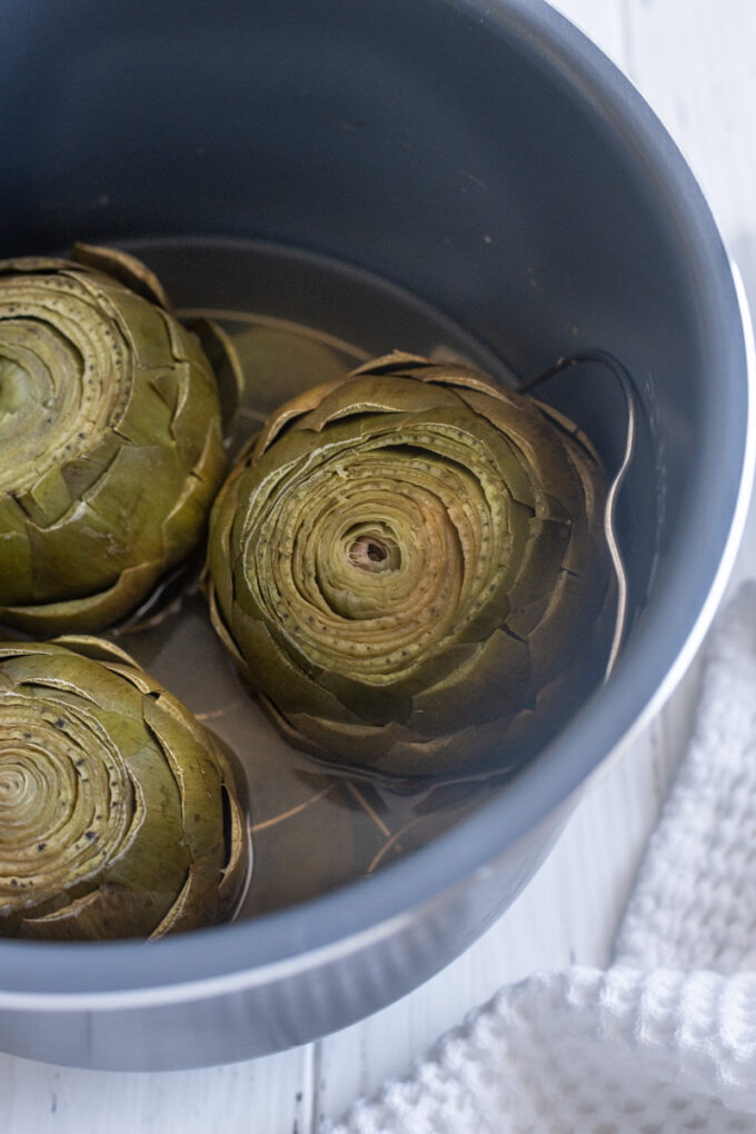 Whole steamed artichokes cooked in the Instant Pot.